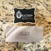 jennifer aniston silver perfume top