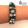 green bracelet J Crew with rhinestones