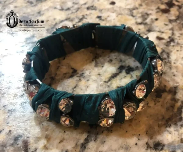 green bracelet J Crew with rhinestones