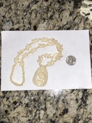 carved necklace