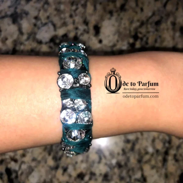 green bracelet J Crew with rhinestones