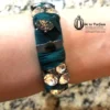 green bracelet J Crew with rhinestones
