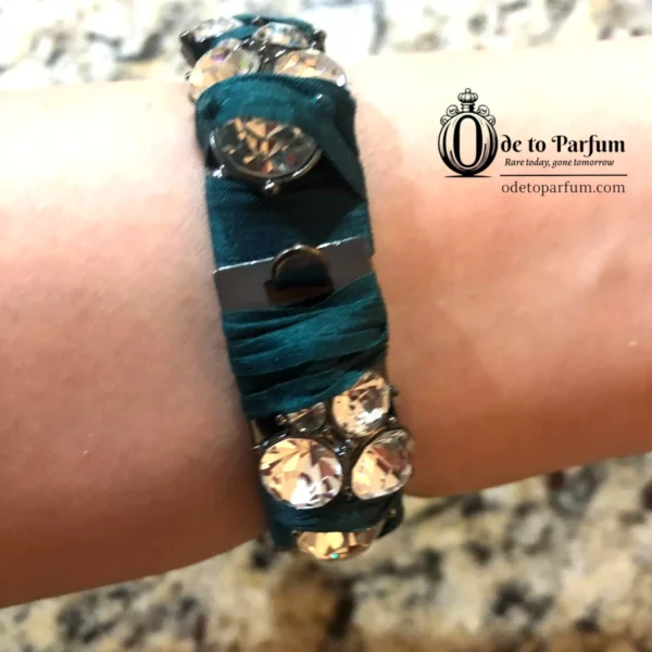 green bracelet J Crew with rhinestones