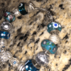 pandora bracelet with blue and silver beads