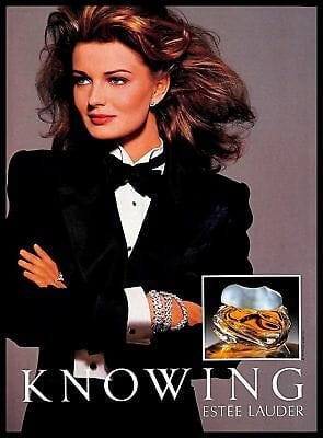 Estee Lauder Knowing vintage ad with woman wearing black blazer and bowtie