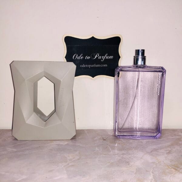 God is a Woman eau de parfum God is a Woman eau de parfum, displayed out of gray holder