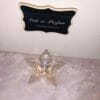 American Girl perfume Truly Me pictured from top, star bottle
