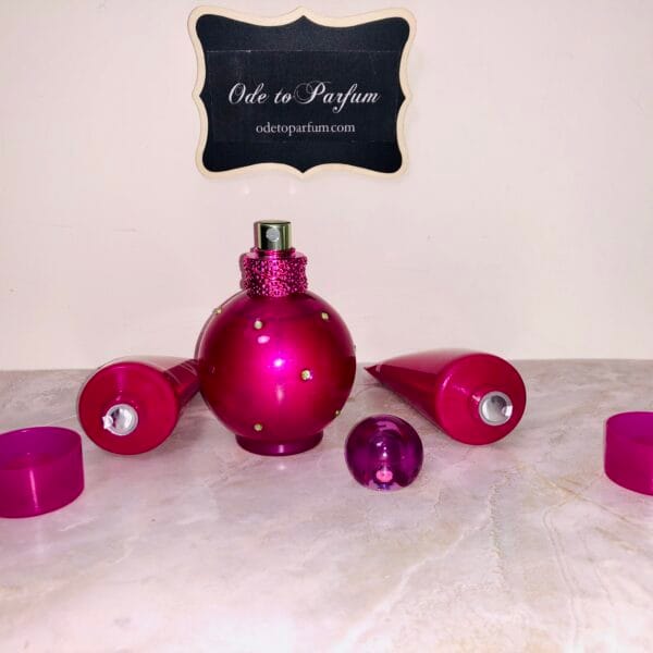 britney spears fantasy bundle: 1.7 fl oz eau de parfum spray, body souffle, and shower gel, cap off and seals shown