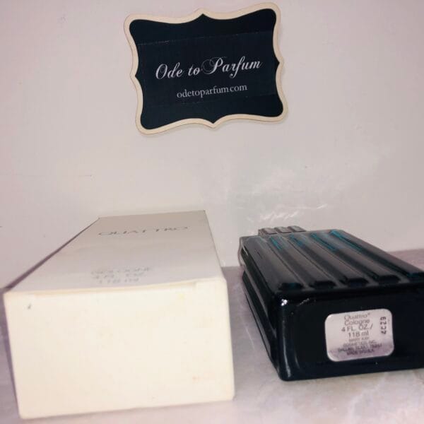 mary kay quattro cologne pictured next to box bottom of bottle and box