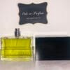 Gucci Envy for Men eau de toilette spray 3.4 fl oz , pictured with cap off and next to bottle