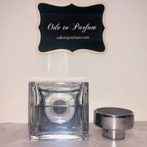 banana republic slate eau de toilette - original vintage version with silver cap - pictured with cap off and bottom label of bottle visible