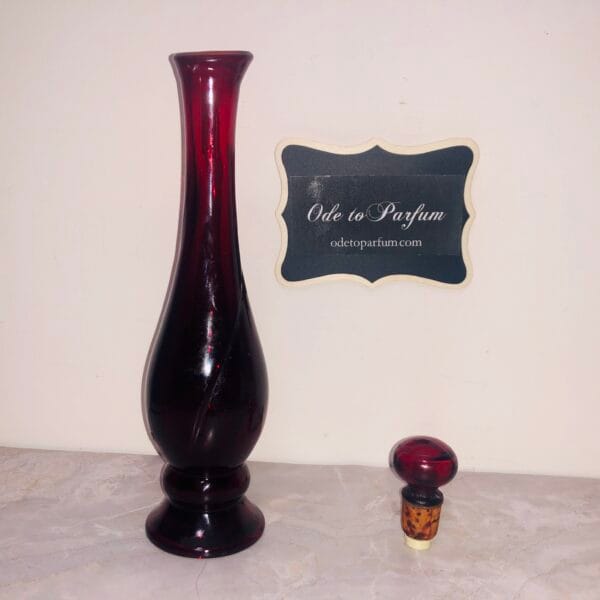 Avon Rose Bud Vase with cap off Avon Rose Bud Vase with cap off