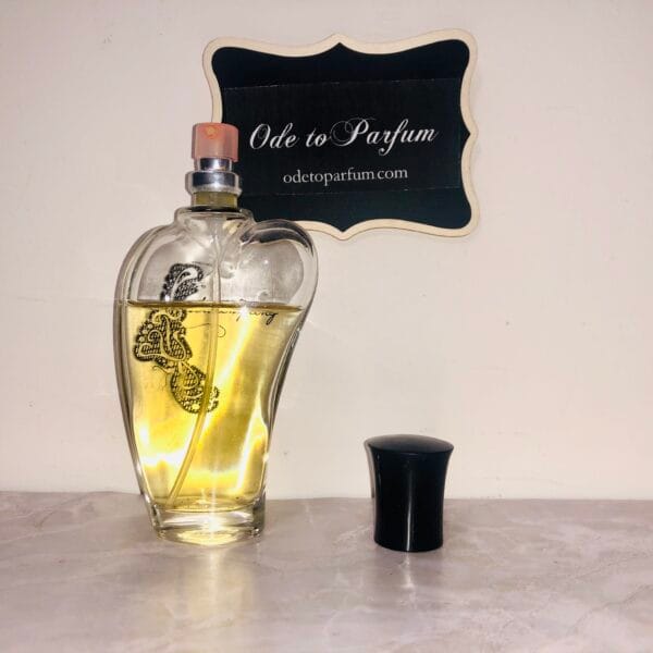 Avon be Tempting perfume with cap off