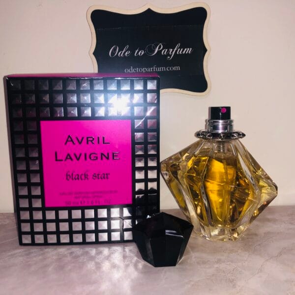 Avril Lavigne Black Star perfume with cap off next to box