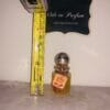 My Melody Moschus Musk Perfume EDT next to steel tape measure