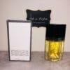 backs of Oscar by Oscar de la Renta perfume, next to box, in front of Ode to Parfum sign,