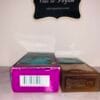 Animale perfume next to its box - bottom sides of both
