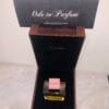 amber oud tobacco edition eau de parfum standing in velvet-lined box, pictured from the top