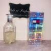 tommy girl shimmering body mist by tommy hilfiger, next to holographic box