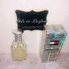 tommy girl shimmering body mist by tommy hilfiger, next to holographic box