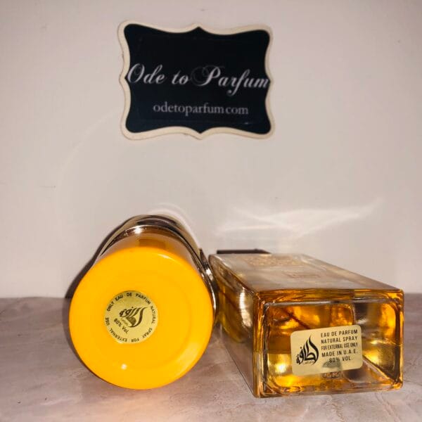Lattafa Yara Tous & Ana Abiyedh Rouge perfumes in front of Ode to Parfum sign